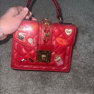 Stylish Red Quilted Handbag with Embellishments